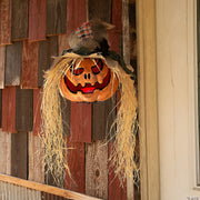 11-3-4-x-27-1-2-hanging-pumpkin-head-plastic-halloween-decoration
