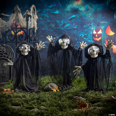 23 1/2" Light-Up Eyes Yard Stake Grinning Reapers Set